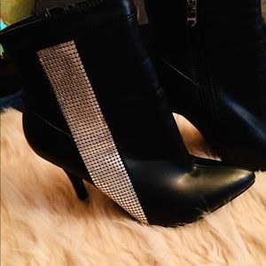 Black heeled boots with bling